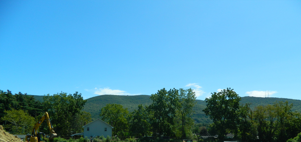 A summer view of Mount Beacon from the Beacon Knoll new home community by Rieger Homes, located in Beacon, New York