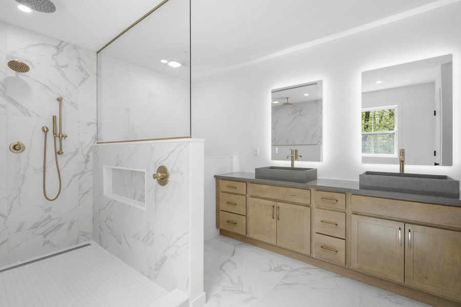 Primary Bath with huge walk-in shower, double vanity and lighted mirrors with Bluetooth.  The Millbrook on Homesite 5 at Hidden Glen, Millbrook, NY